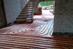 Монтаж теплої підлоги та системи опалення в коттеджі